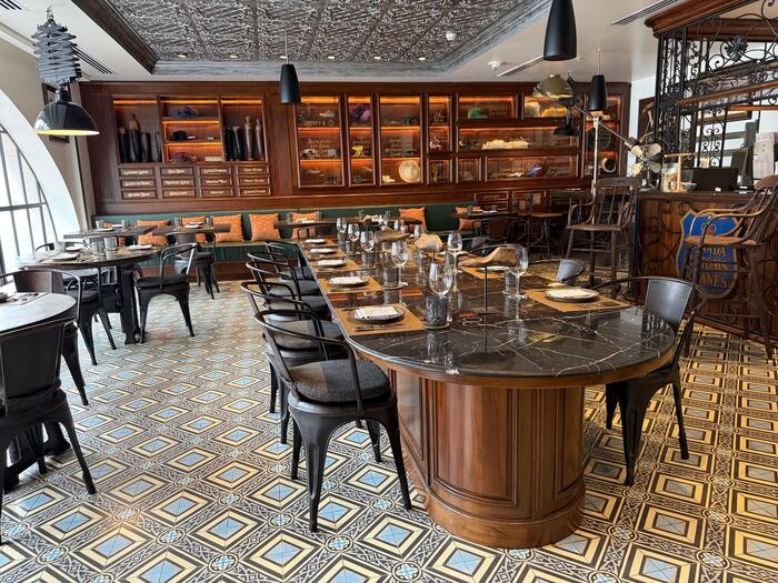 Heritage dining room with glass display cabinets of period accessories