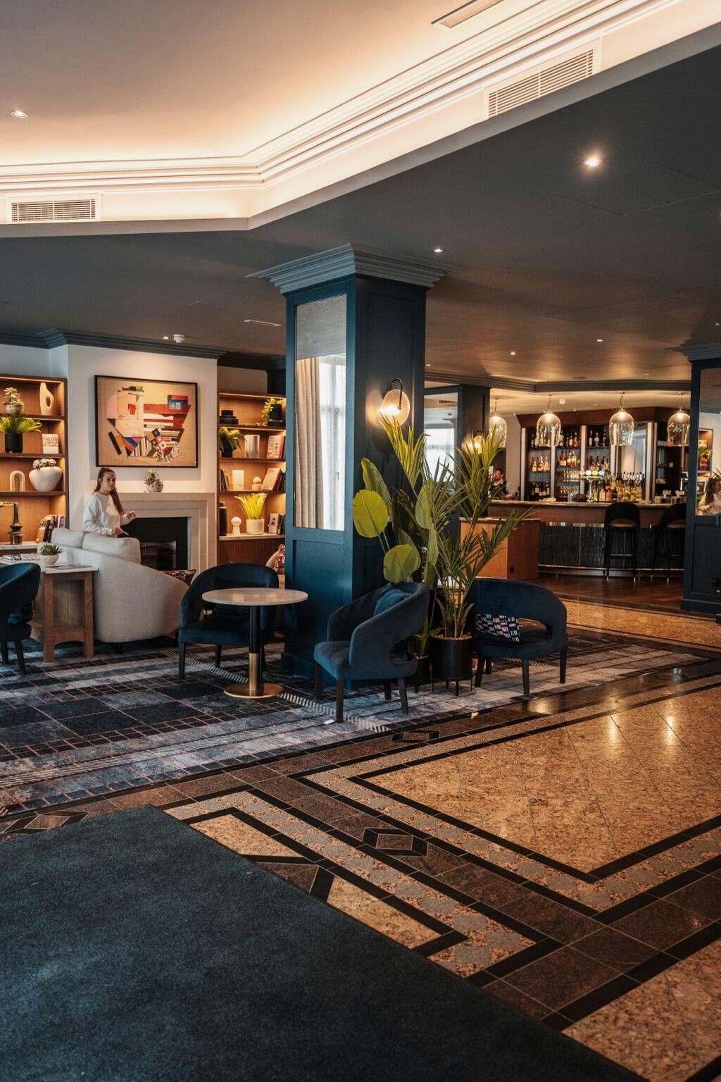 An elegant hotel lobby with layered lighting